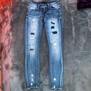 Buckle Black skinny jeans